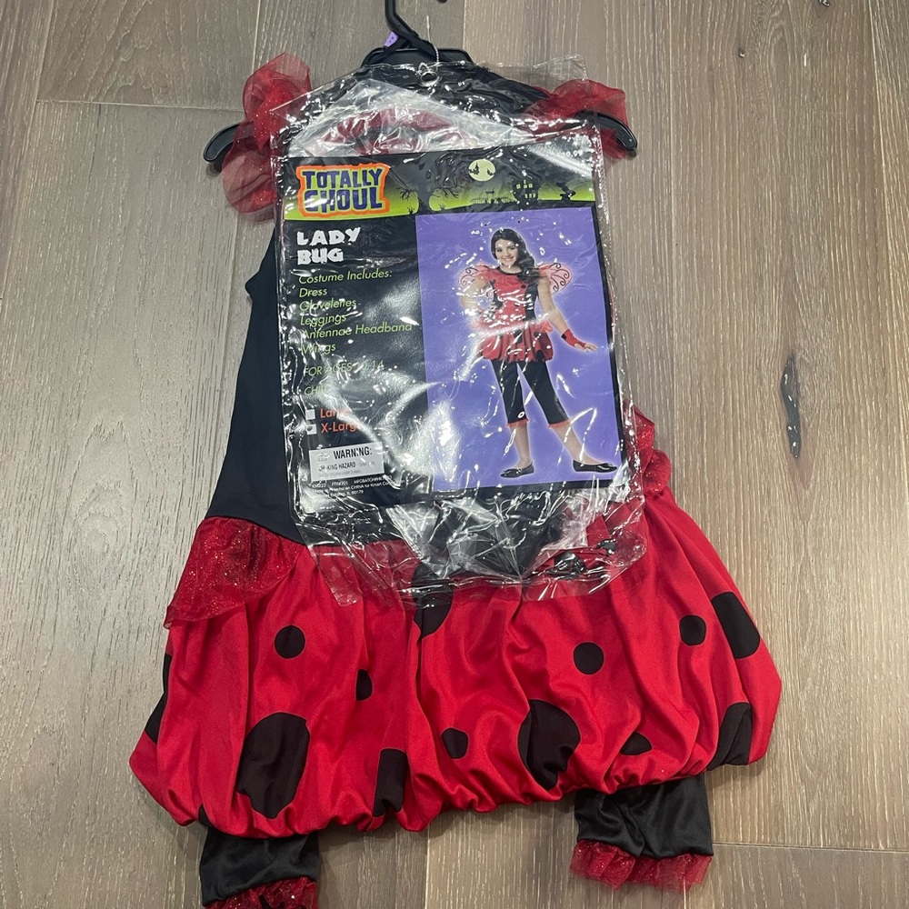 Totally ghoul lady bug deluxe child costume. Nwt. Extra large 10-14(hs)